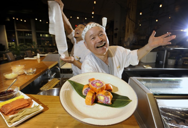 Vancouver , BC. November 7, 2011 -- Chef Hidekazu Tojo Here Tojo has created a Vancouver Sun Celebration Sushi Roll which he shows off in his Broadway restaurant on November 7 2011 Also detail shot of the Sun Celebration roll. (Mark van Manen/PNG) Mia Stainsby stories ) 00057062A